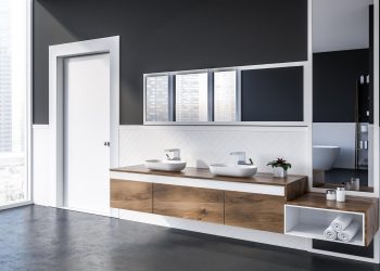 Transform Your Bathroom Using Beautifully Designed Custom Cabinets with Professional Remodeling.